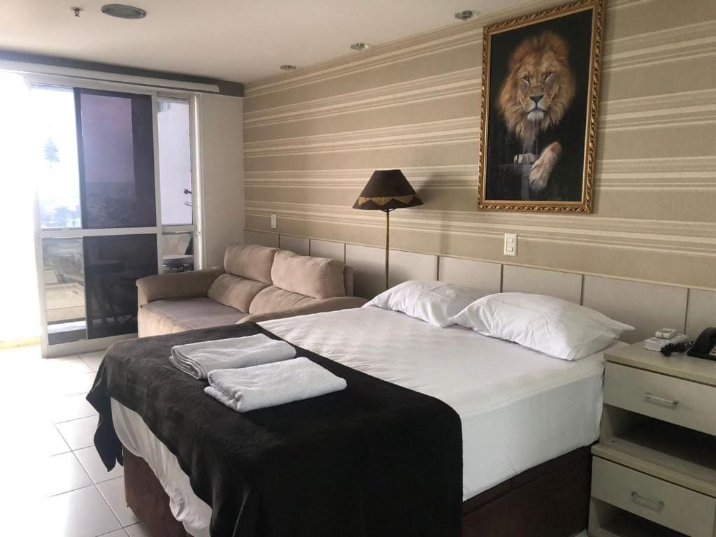 Flat Hotel morador 1110 Suíte,Sofá,Varanda,Cozinha — 1